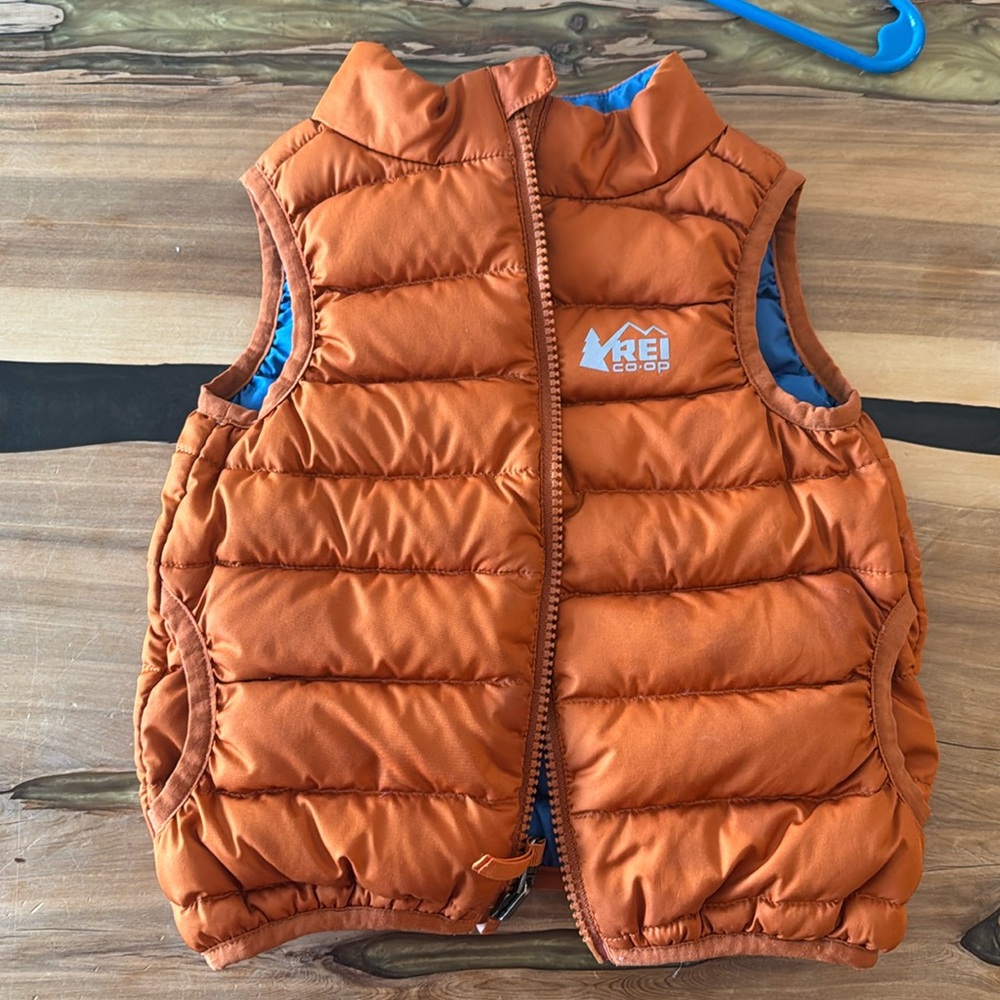 REI orange (blue) reversible- puffer vest. 18 months